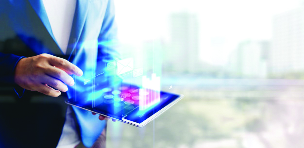 Reflection-businessman-using-tablet-analyzing-data-economic-growth-graph-chart-copy-space-concept-tablet-with-hologram_44282-8 | Maritime Gateway - South Asias Premier Shipping and Logistics News Portal